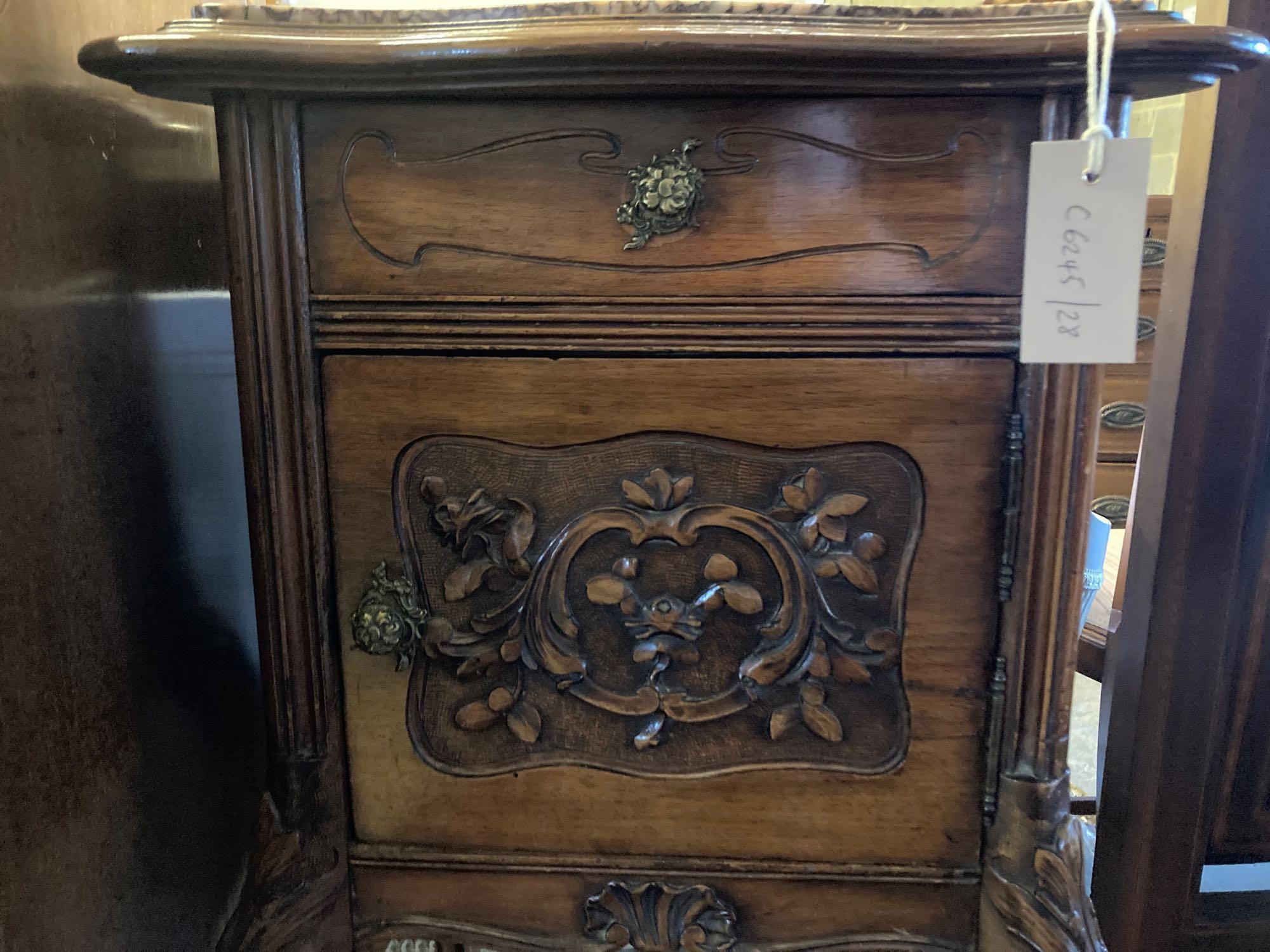 An Edwardian carved walnut bedside cabinet, with marble top and ceramic lined interior, width 41cm height 90cm